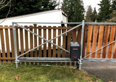 16x6-automatic-Cantilever-gate-with-1x6-cedar-boards-RSL-12-gate-operator-400x284