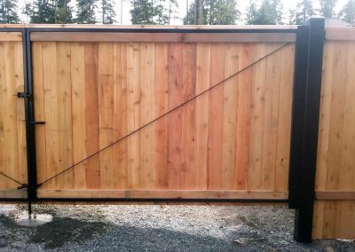 20-steel-framed-wood-DD-gate-with-steel-hinge-posts-from-back-400x284
